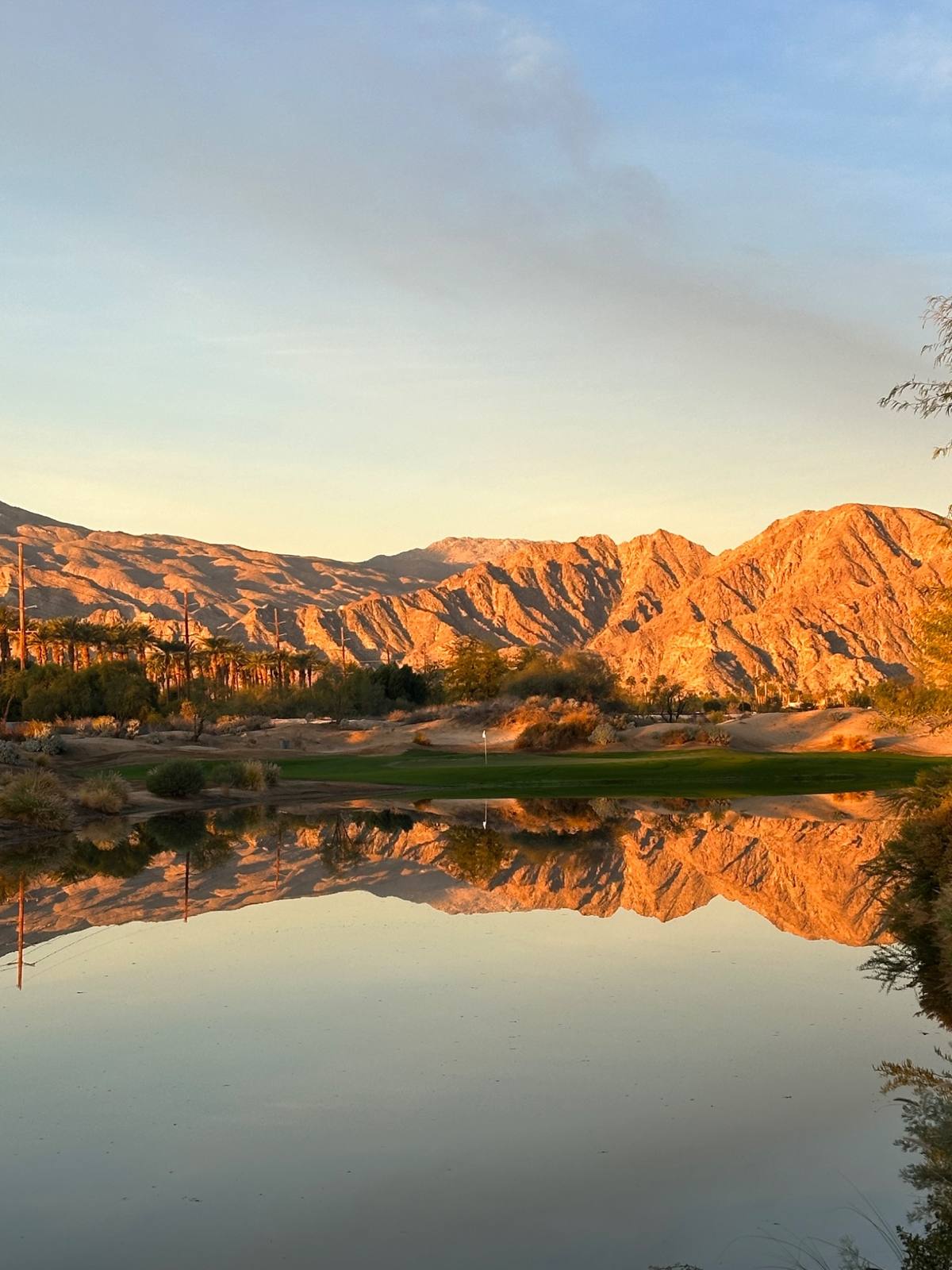 Desert golf course at sunset
